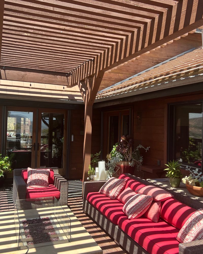 Backyard patio with shaded pergola